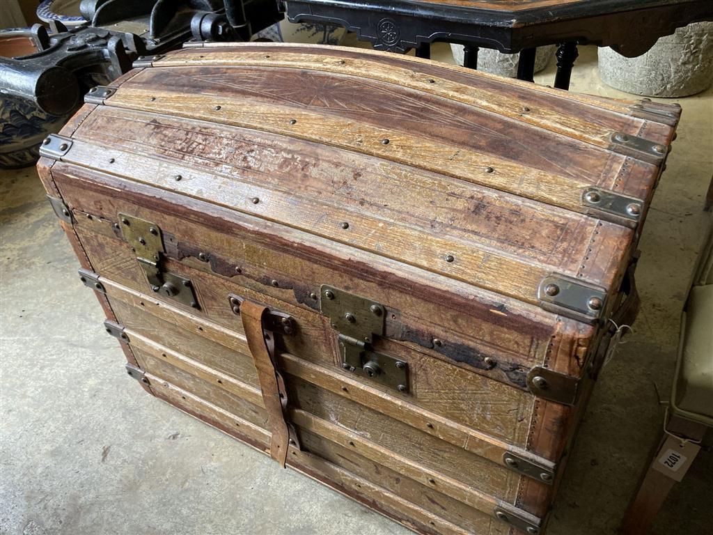A late Victorian domed top travelling trunk, length 86cm, depth 52cm, height 64cm